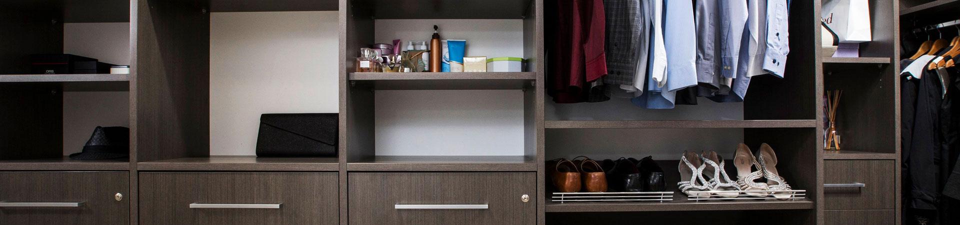Flexi Renovations Perth Custom built-in wardrobe with dark timber finish featuring shelving, drawers, hanging space and shoe rack storage solution