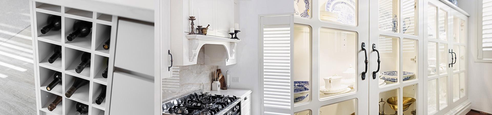 Flexi Renovations Perth White custom kitchen cabinetry featuring built-in wine rack, decorative range hood, and glass-front display cabinets Perth