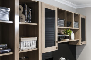 Contemporary home office in Iluka with custom wood shelving, desk, black chair and shutters. A29V7014-1024x683.jpg