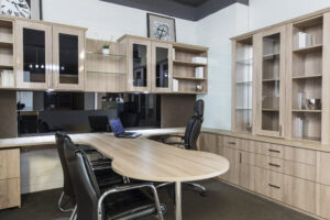 Modern executive office in Myaree featuring a sleek desk, chairs, and storage cabinets. Professional workspace.