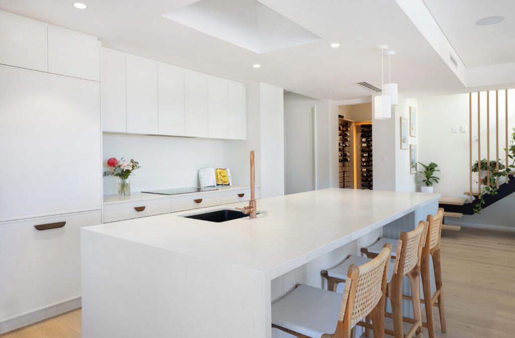 Flexi Design Journey: Bright kitchen with island, bar stools, and wine storage. Modern interior.